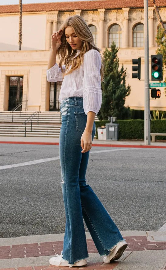 Bold Moves High Rise Distressed Raw Hem Flares